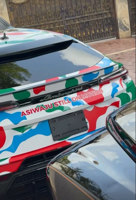 Cubana Chief Priest flaunts branded luxury vehicles for Tinubu's re-election campaign.