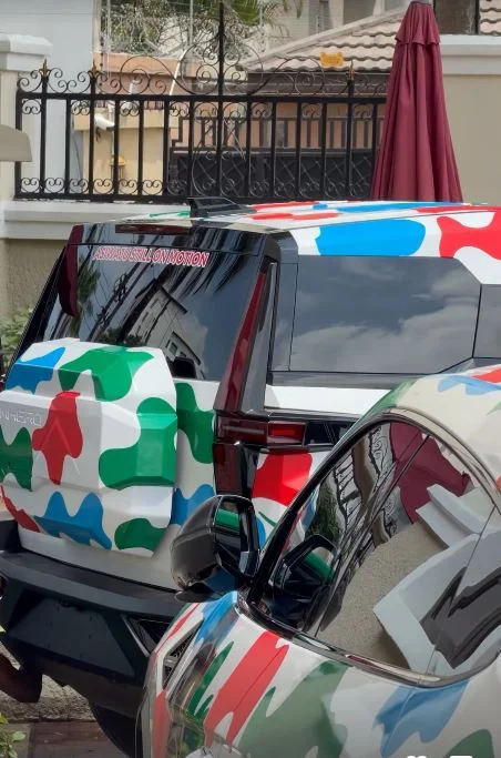 Cubana Chief Priest flaunts branded luxury vehicles for Tinubu's re-election campaign.